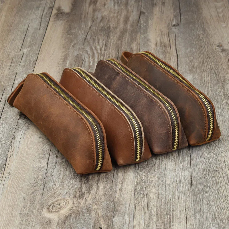 Black handmade cowhide leather pencil case with zipper, showing square 18cm design.
