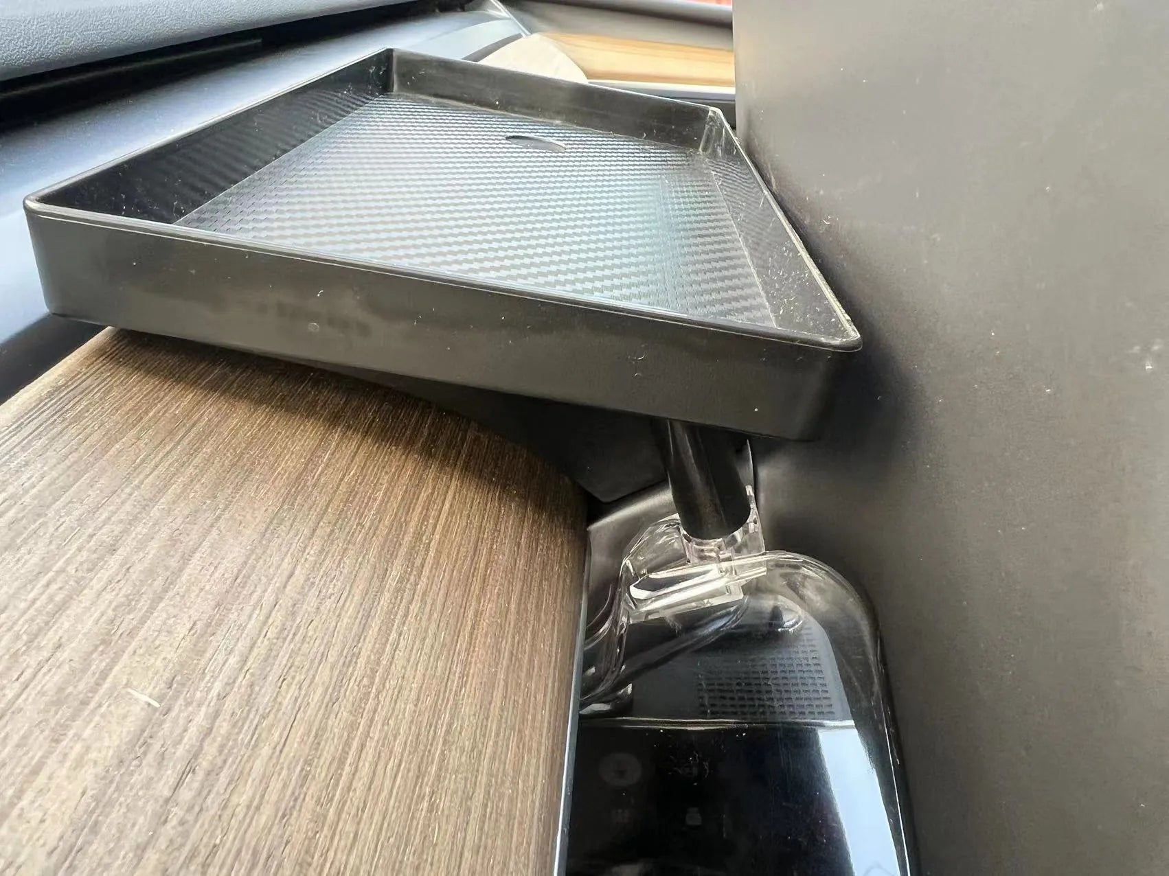 Black ABS storage box for under the ETC tray in a Tesla Model 3 or Y interior.