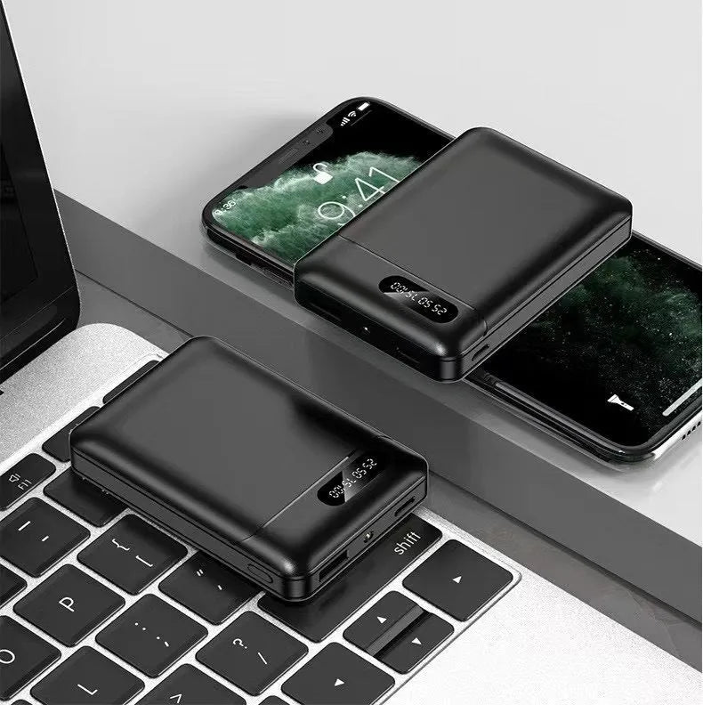 White or black 10000mAh portable power bank with dual USB charging ports