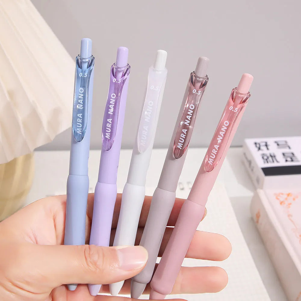 Macaron colour press gel pen with 0.5mm tip shown in smoked brown, white, and pink ink options