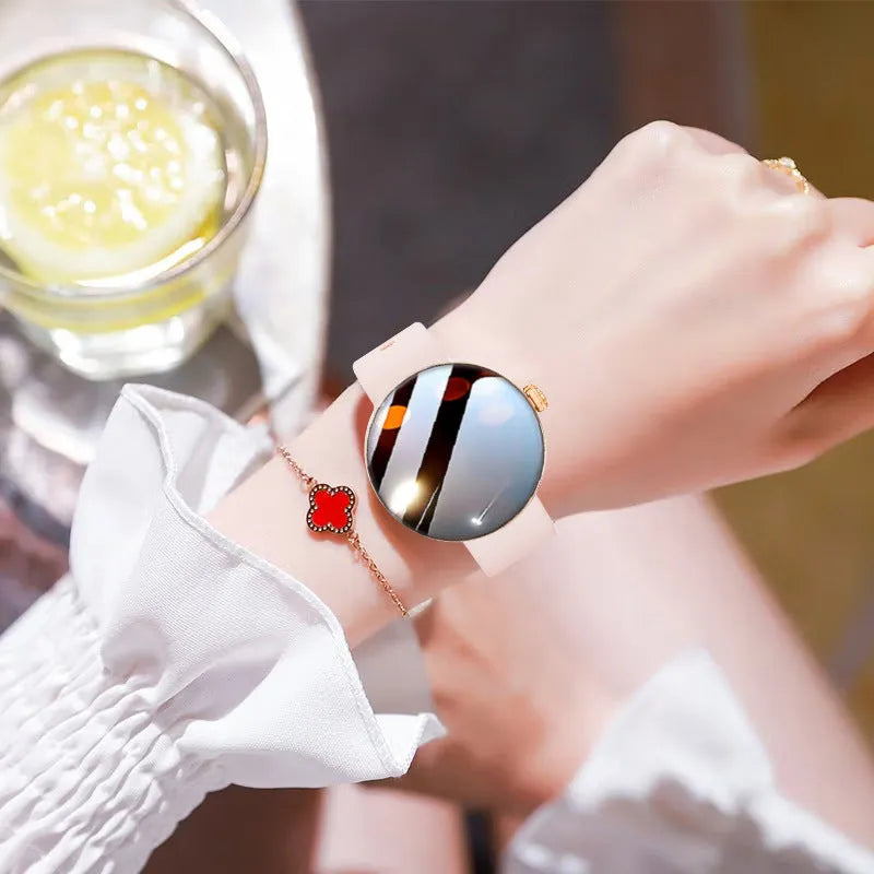 Women's circular smart watch with colour screen and metal strap on wrist
