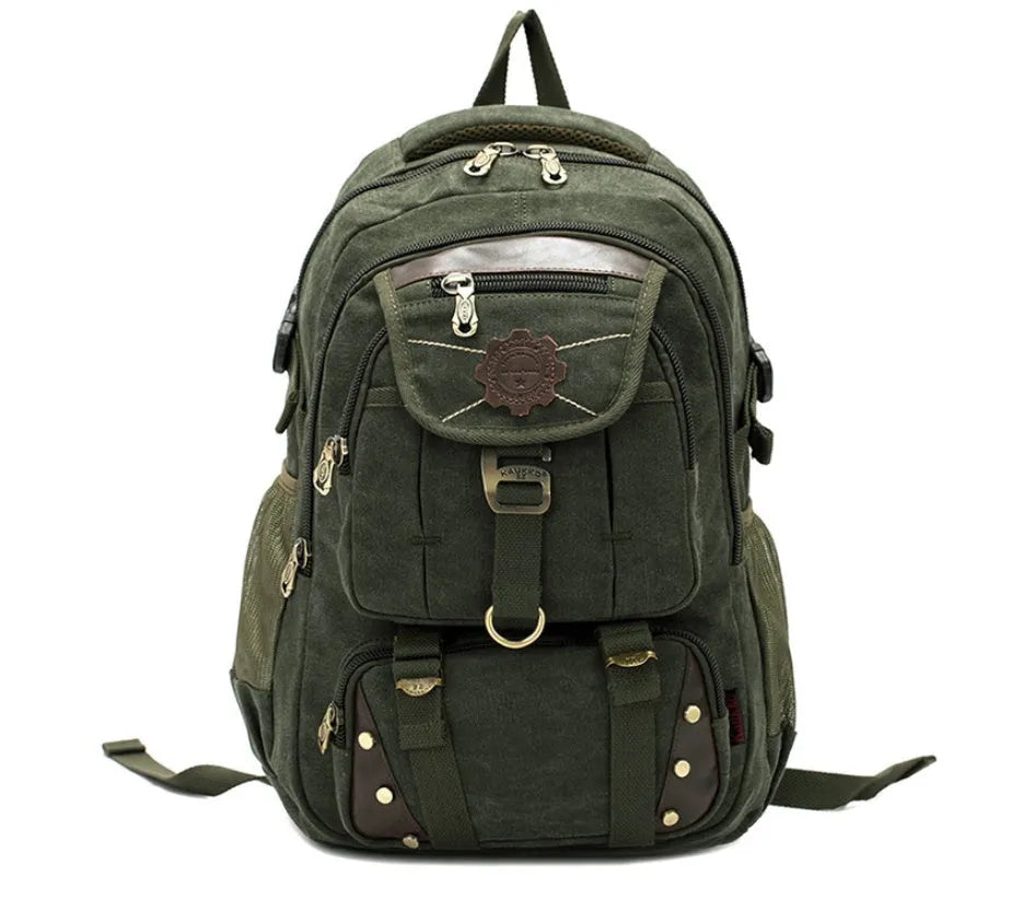 Canvas computer backpack in black with square vertical shape, zip closure, and multiple pockets