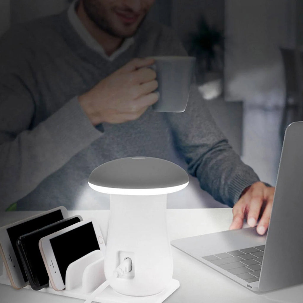 White mushroom-shaped LED charging dock station with 5 USB ports for phones and tablets.
