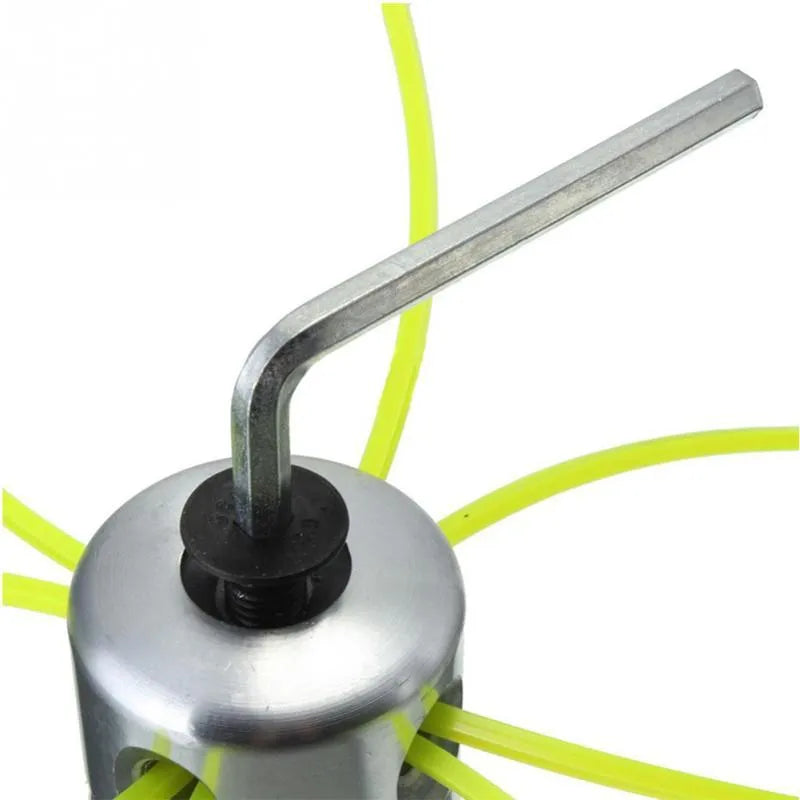 Silver aluminium lawn mower grass trimmer head with four light yellow square lines, a wrench, and a gasket