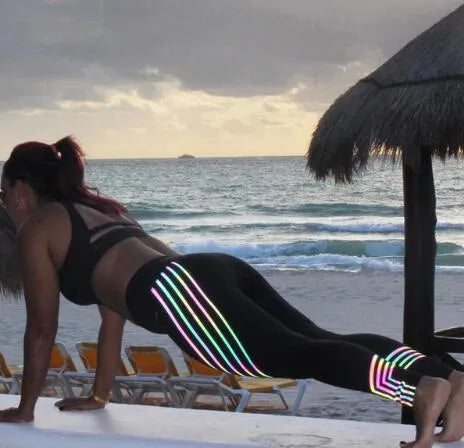 Women's black and white print workout leggings with slim fit pencil pants design.