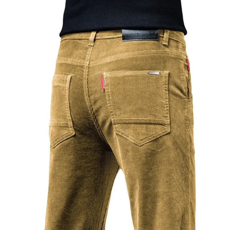 Straight slim-fit cotton corduroy trousers in brown, shown from front