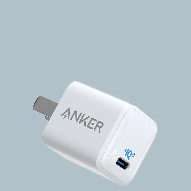 White 18W travel USB charger for mobile phones with fast charging capability