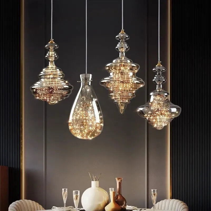 Modern glass droplight chandelier with adjustable suspension showing clean contemporary design