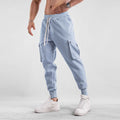 Men's loose cotton sports trousers with ankle ties and multiple pockets in various colours
