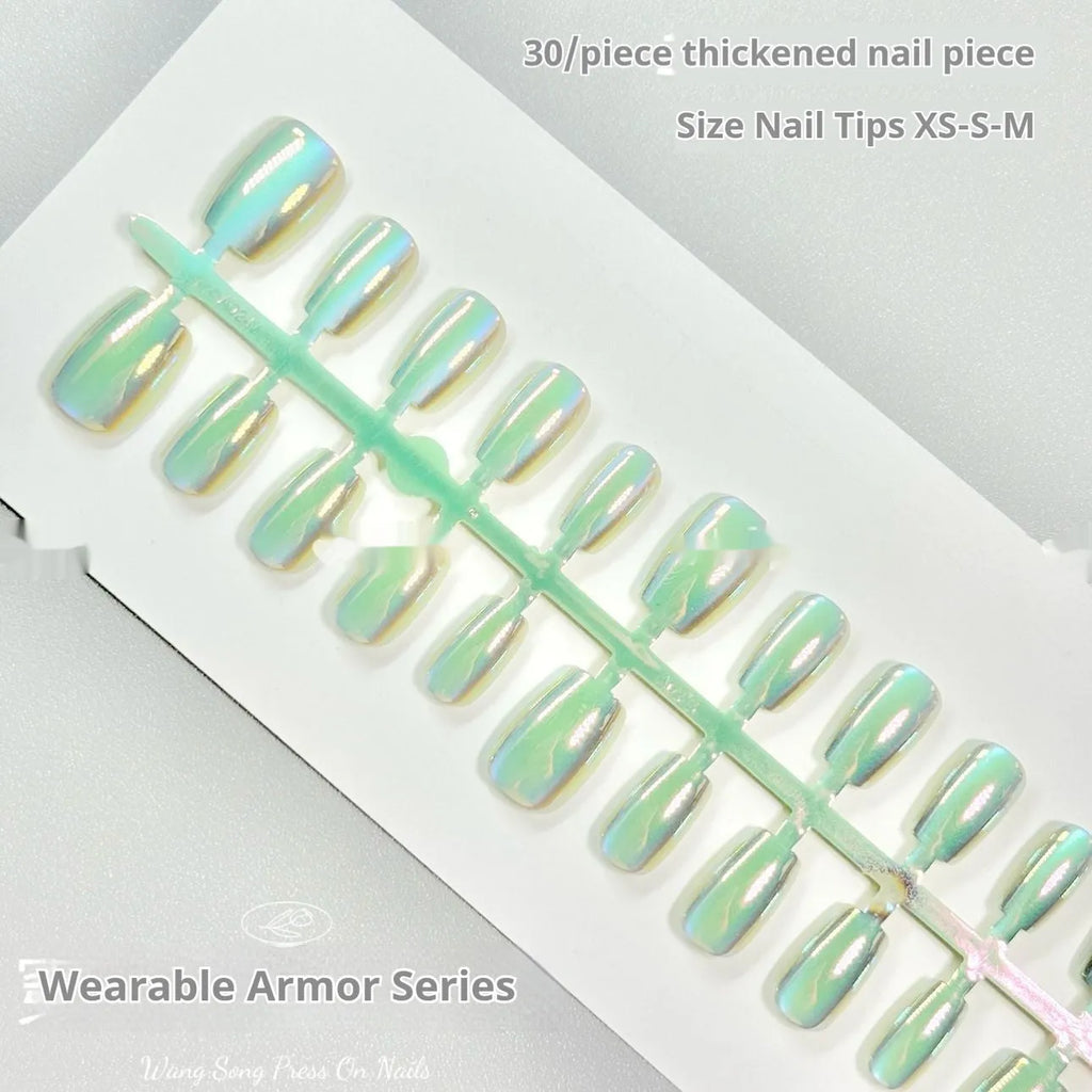 Set of electroplated Cat's Eye false nails showing Aurora armour style on short ladder sized nails.