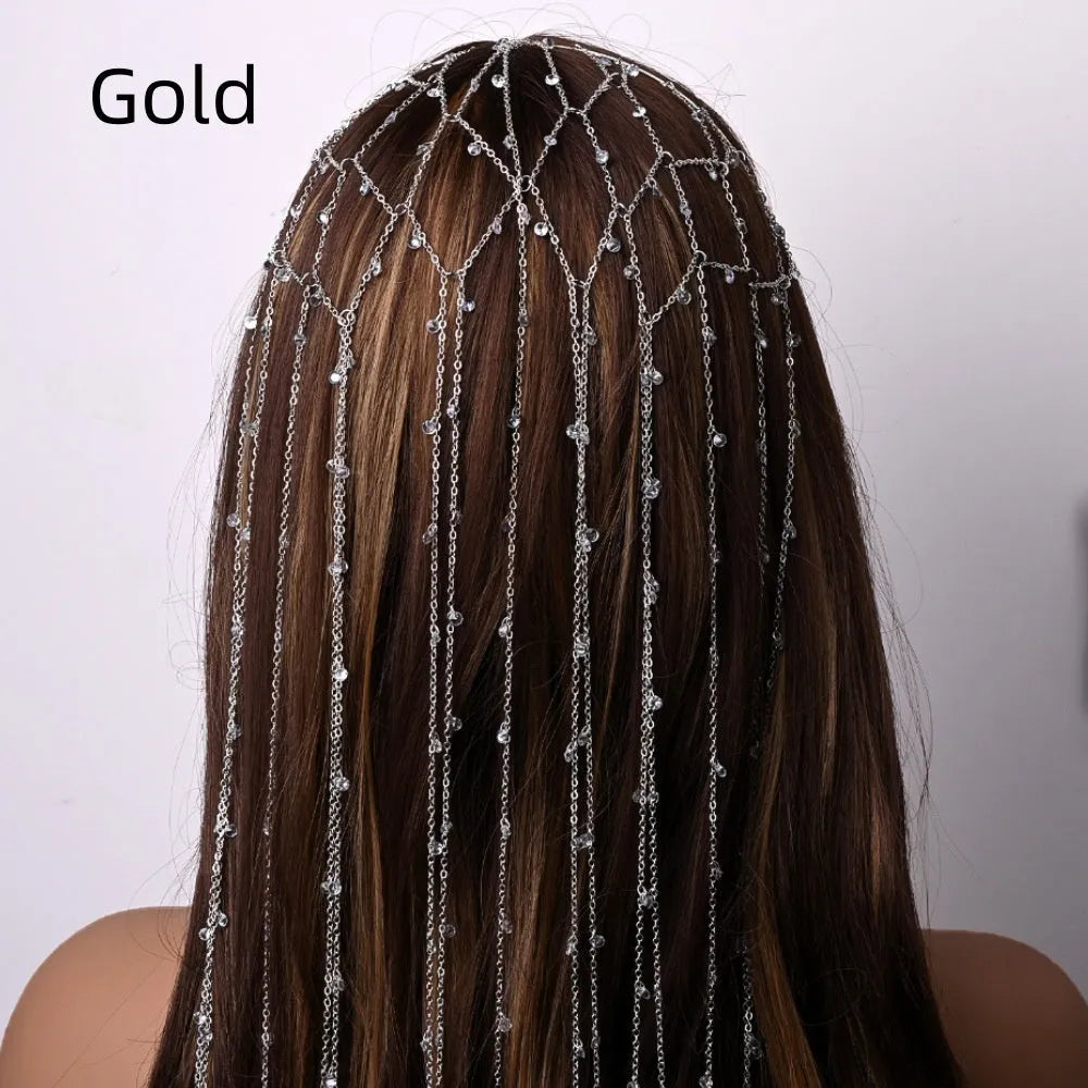 Gold rhinestone headband with dangling tassel mesh for formal hairstyles.