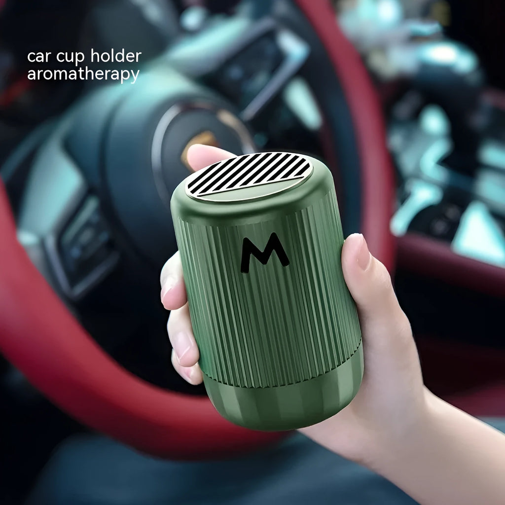 Solid car and home aromatherapy decoration cup in choice of four scents, dimensions 10 by 6 centimetres.