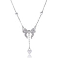 Close-up of a silver heart pendant necklace with butterfly detail on a 40-45cm O-ring chain.