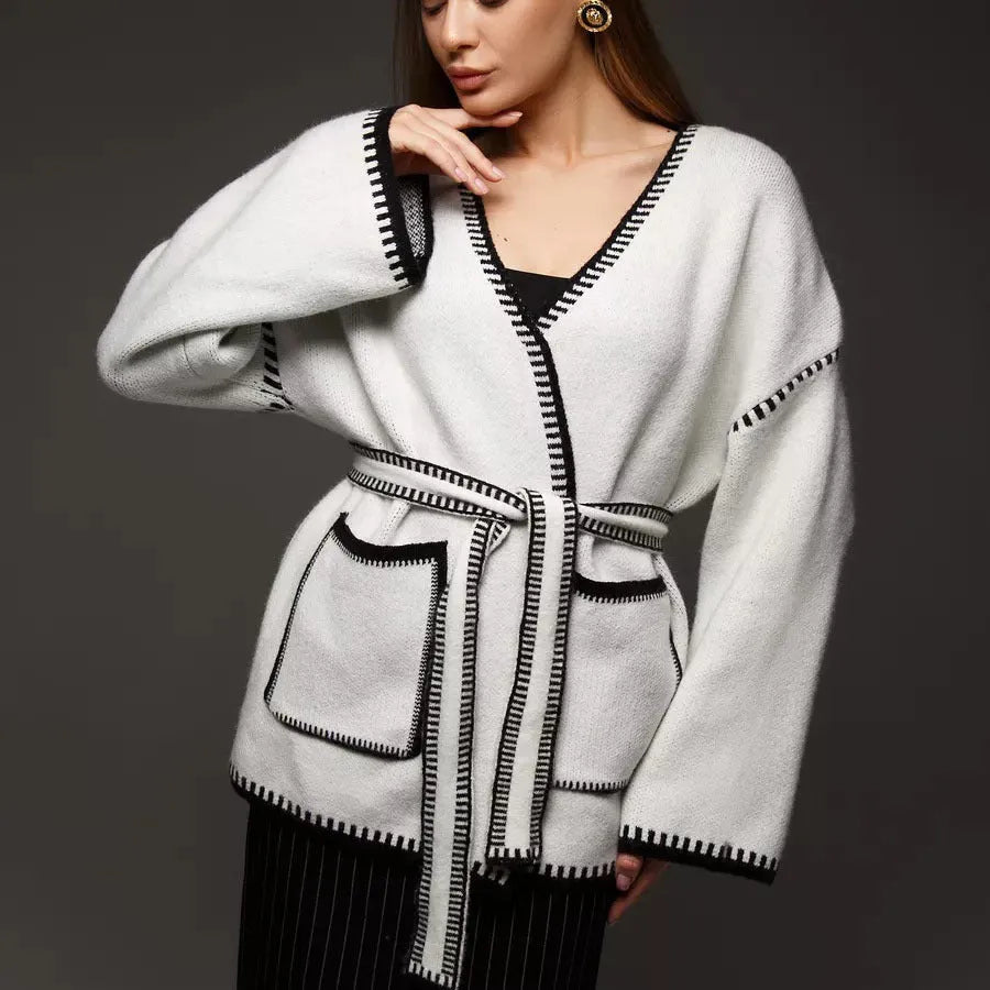 Lace-up front knitted cardigan in black camel or white colours with loose fit and long sleeves