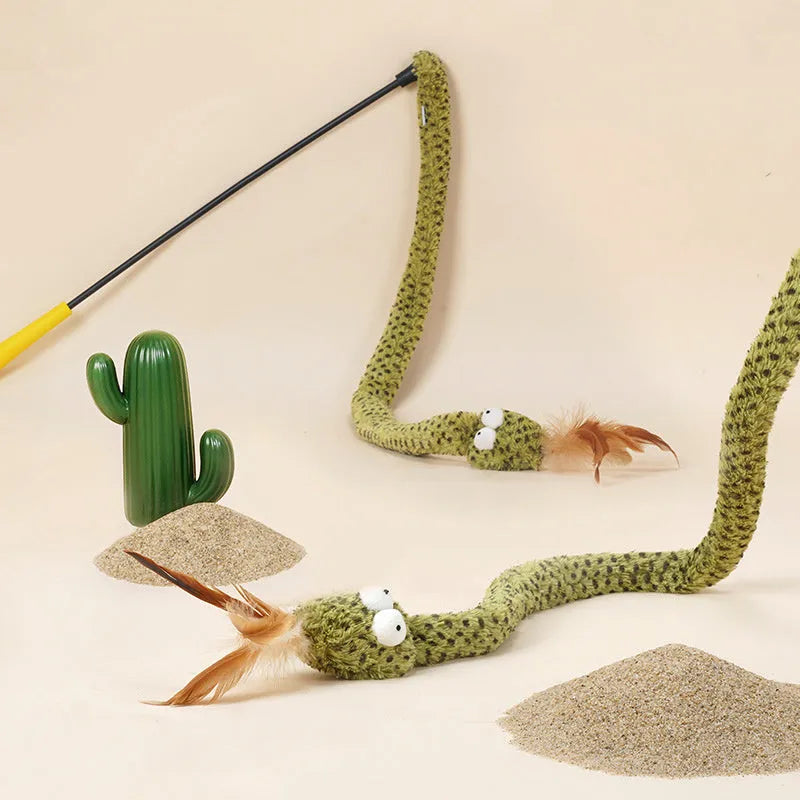Long green cat teasing wand with feather toy on a white background