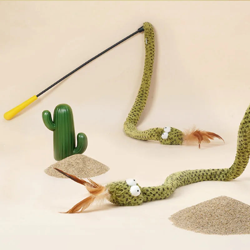Long green cat teasing wand with feather toy on a white background