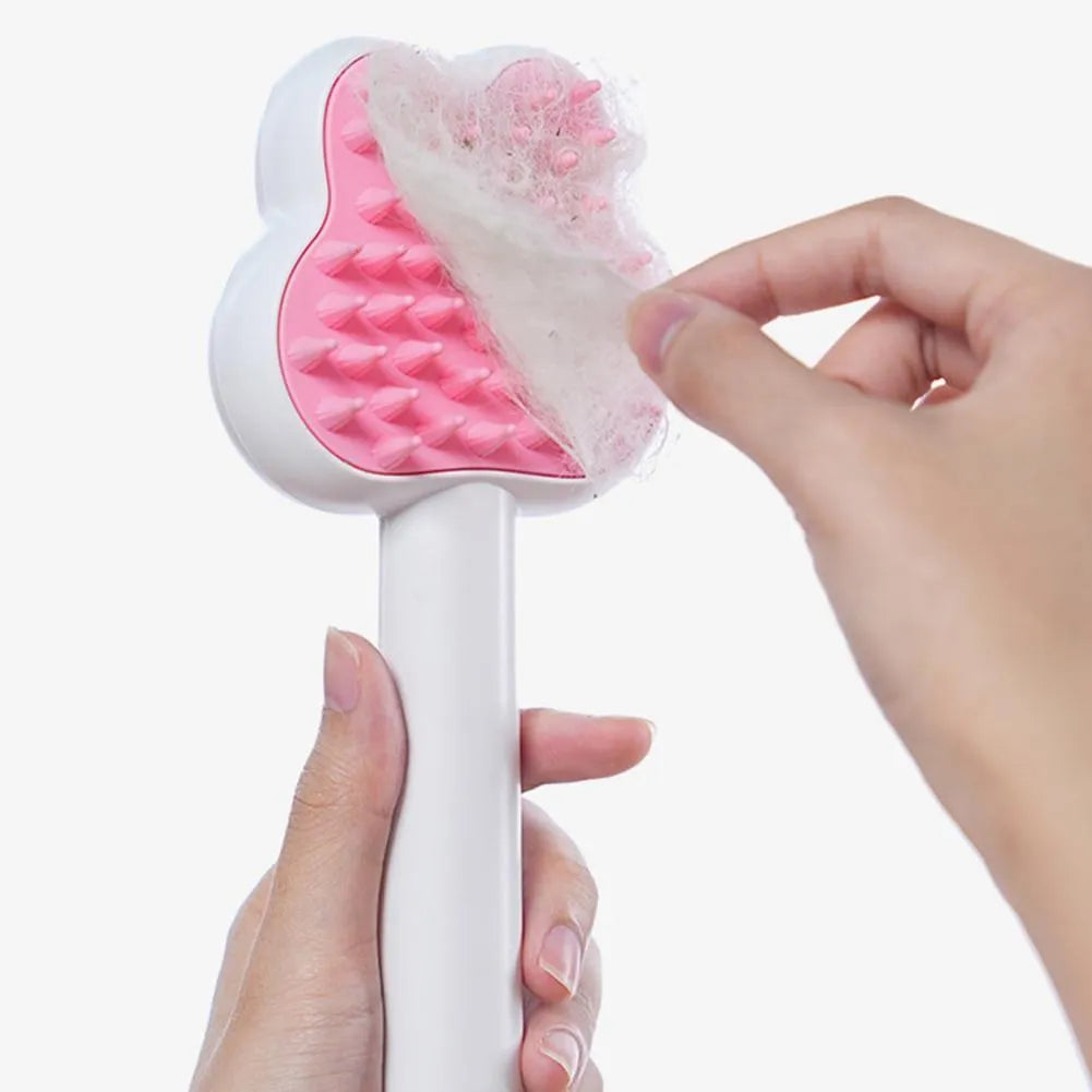 Rechargeable cat steam grooming brush with long handle and rounded brush end in choice of colours