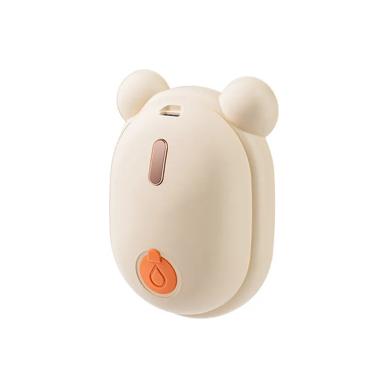 Pink and yellow rechargeable pet grooming brush with spray bottle, soft rubber teeth, and a removable silicone comb.