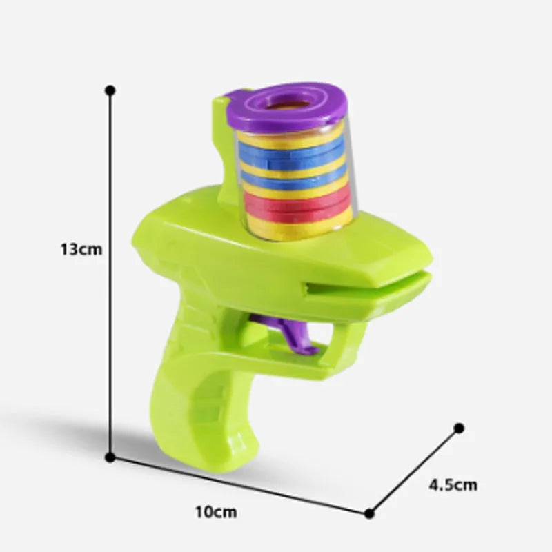 Interactive plastic cat toy launcher with foam disc projectile in green or purple colours