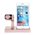 White 2-in-1 charging dock station holding an iPhone and an Apple Watch upright on a desk.