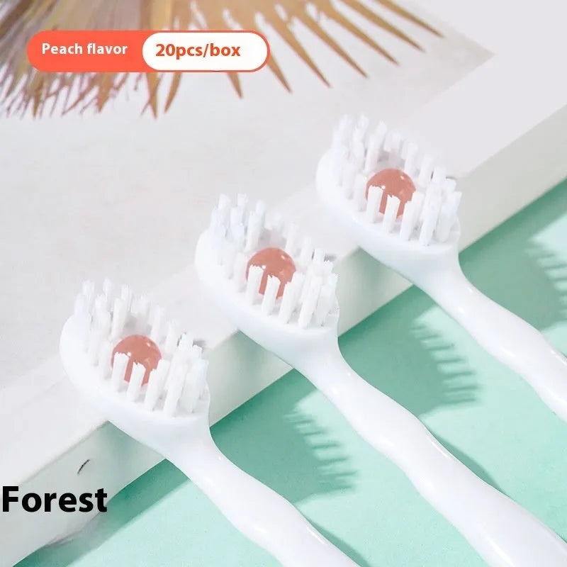 Box of 20 disposable bead toothbrushes for travel, shown with mint and peach flavour options.