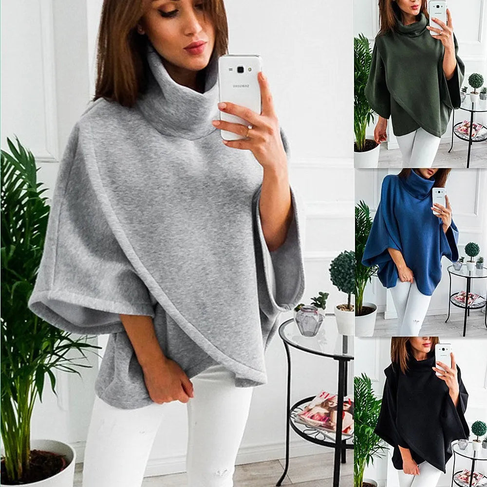 Long grey women's cardigan with batwing sleeves and three-button placket laid flat