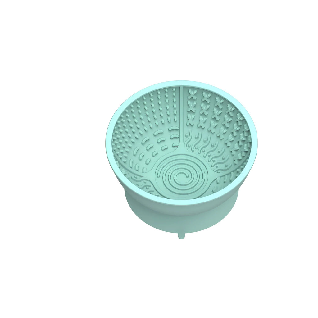 Cyan silicone pet licking mat slow feeder bowl with suction cup base, measuring 15.8cm across.