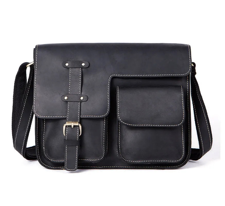 Vintage brown leather messenger bag with antique brass buckle and crossbody strap