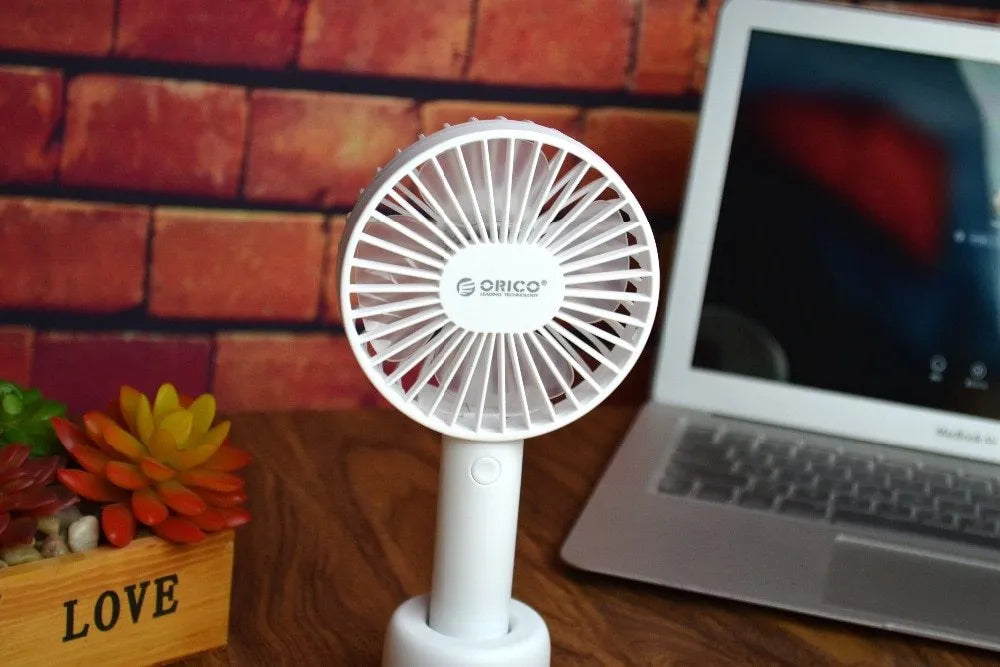 ORICO FH1 white portable USB rechargeable fan with adjustable speed settings and handheld design