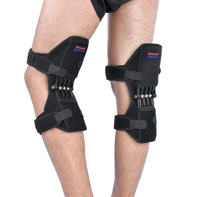 Black spring knee brace with adjustable straps on a grey background