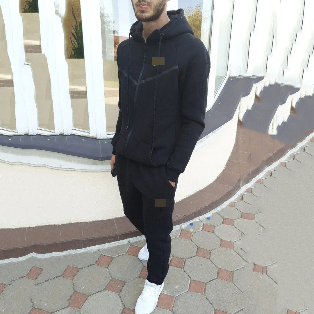 Two-piece sports and leisure set in black spandex, front view, available in sizes S to XL