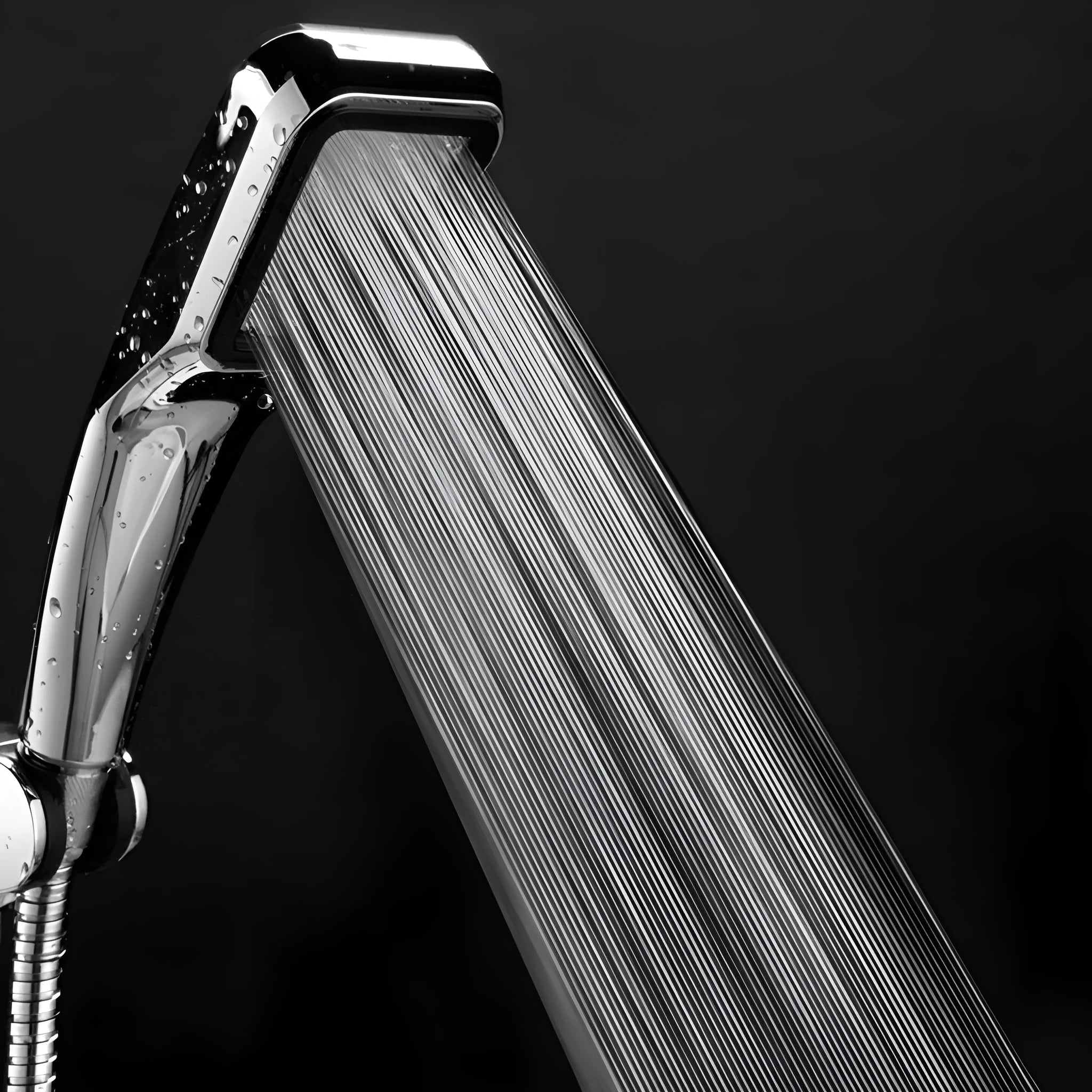 Orange hand-held pressurised shower head with rain function, part of a complete shower set