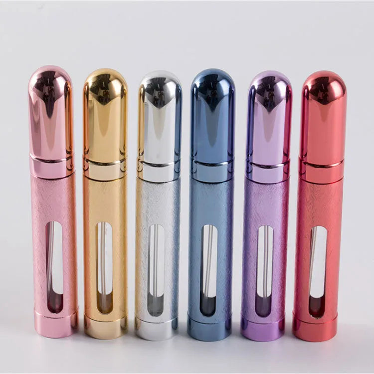 12ml aluminium portable perfume bottle in bullet shape with glass liner, shown in six colour options.