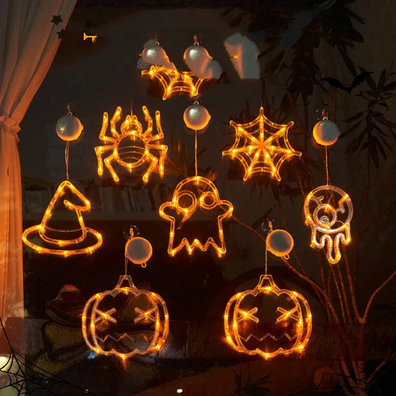Halloween window hanging LED lights with spider, pumpkin and ghost designs on suction cups