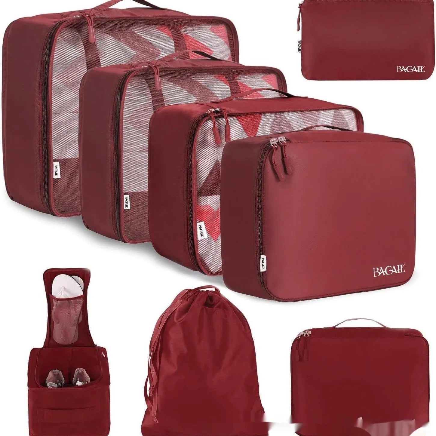 Set of eight cubic-shaped travel packing bags in assorted colours including beige, black, pink, and leopard print patterns.