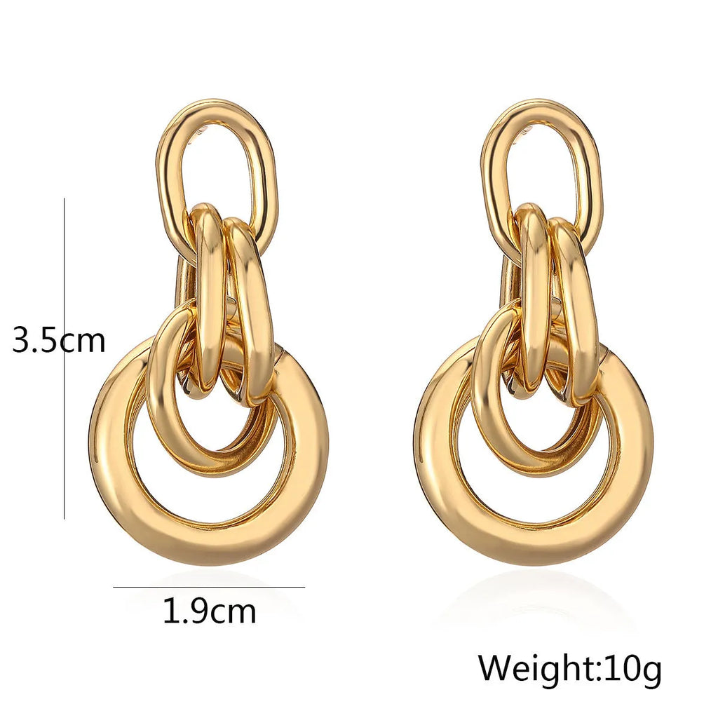 Gold geometric earrings with irregular asymmetric design and INS high-profile styling