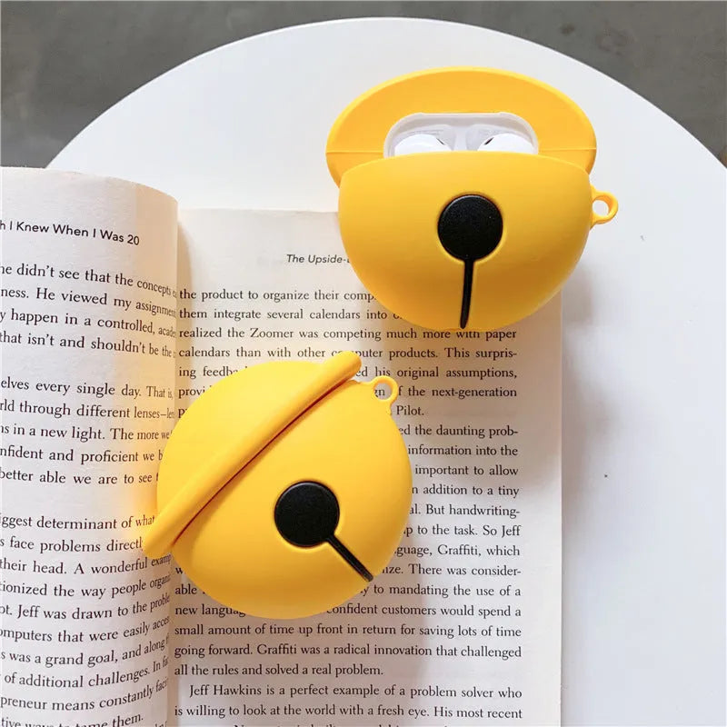 Yellow silicone protective case with a bell charm for 1st and 2nd generation AirPods.
