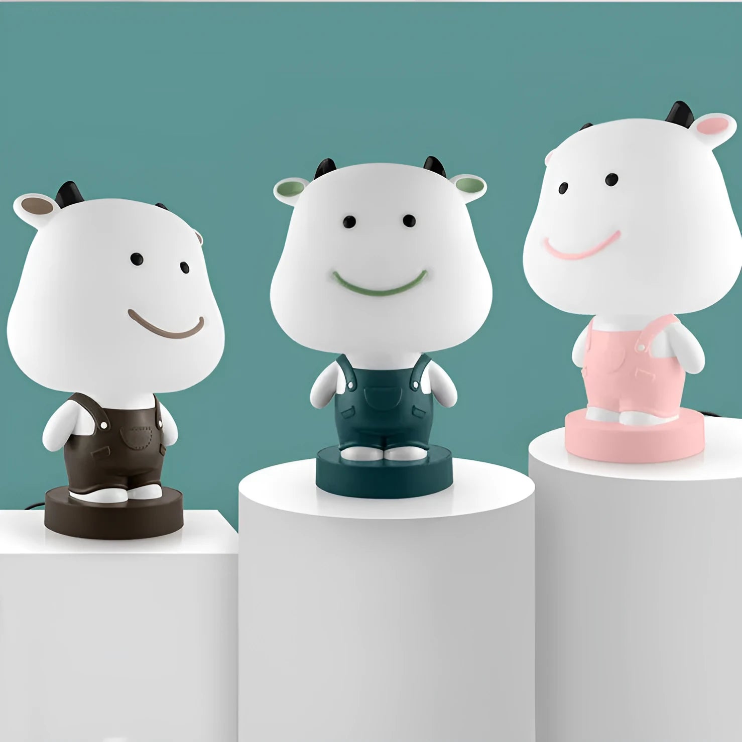 Cartoon animal table lamp with LED lighting and plastic shade in random bear, cattle, rabbit, or tiger designs