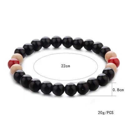 Natural lava stone beaded bracelet with ethnic style on a wrist.