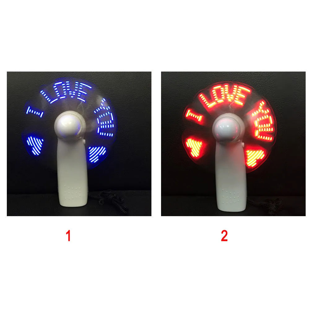 White handheld fan with LED lights displaying I Love You pattern in blue and red colours