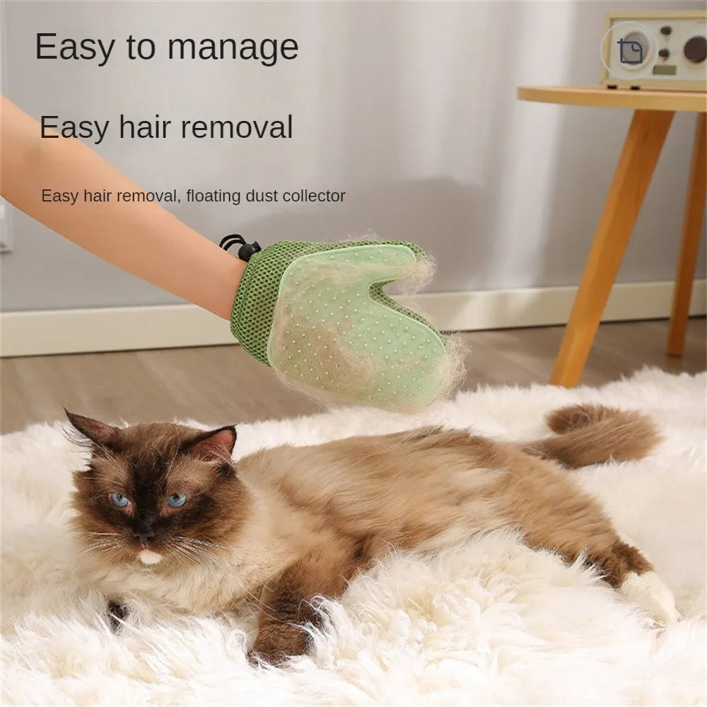 Dark blue pet hair removal grooming glove for right hand on a fabric sofa.