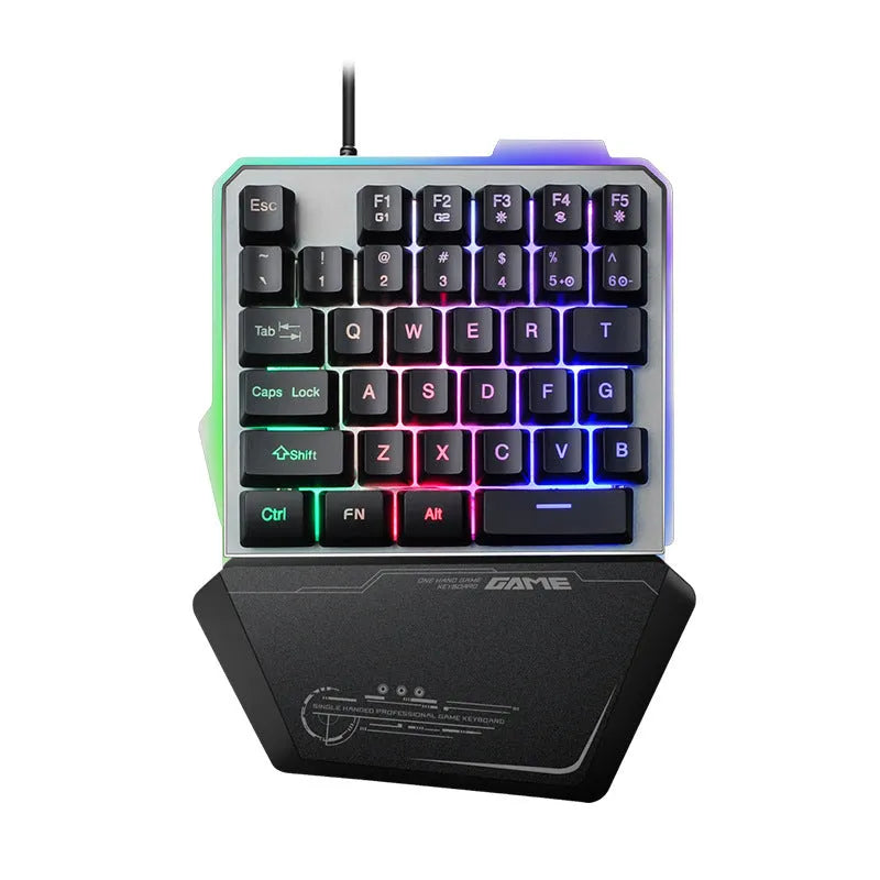 Black robotic one-handed gaming keyboard with RGB backlighting and USB cable