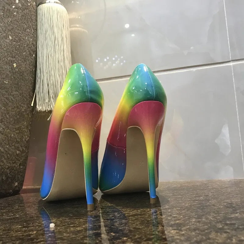 Rainbow coloured patent leather pointed toe high heels with thin ultra-high heel.
