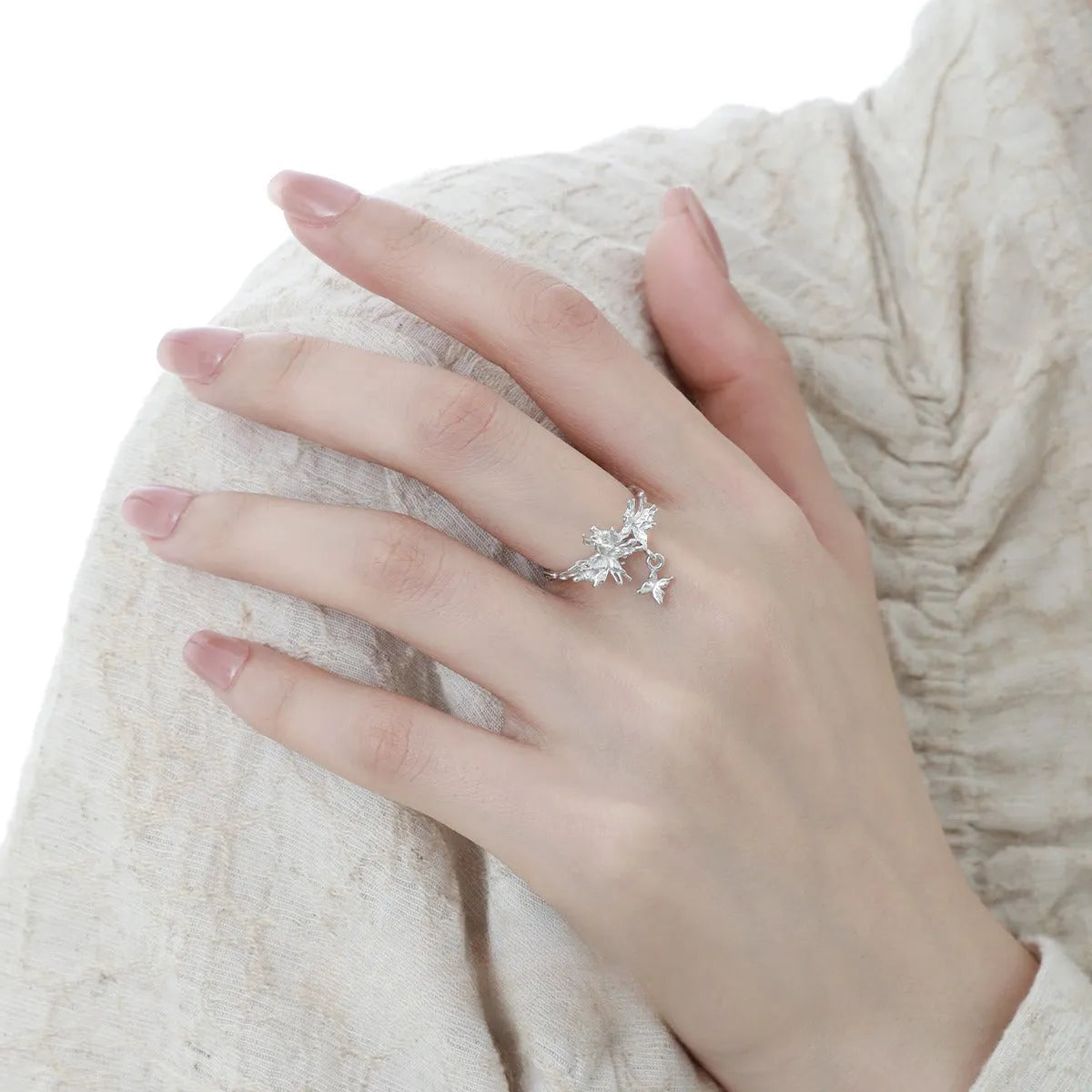 Adjustable opening silver butterfly ring with electroplated finish in white gold or 18K gold colour options