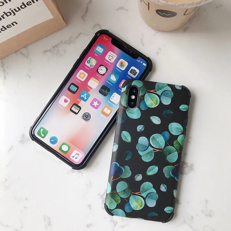 Black silicone iPhone case featuring a raised leaf pattern design.