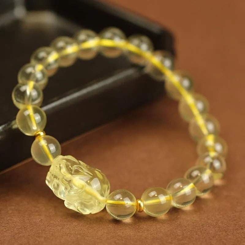 Yellow leather cord bracelet with artificial crystal Pi Xiu charm in Chinese simple style