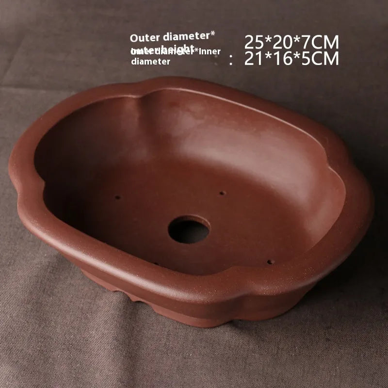 Handmade purple clay bonsai basin in plain Chinese style, shallow rectangular shape.