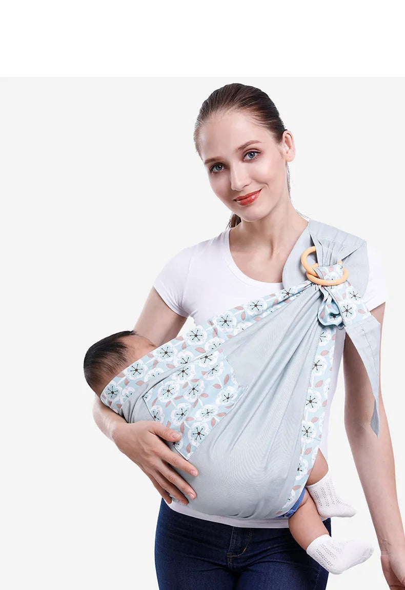 Adjustable baby wrap carrier sling in blue-green cotton and mesh with back support for 0-36 months up to 50kg