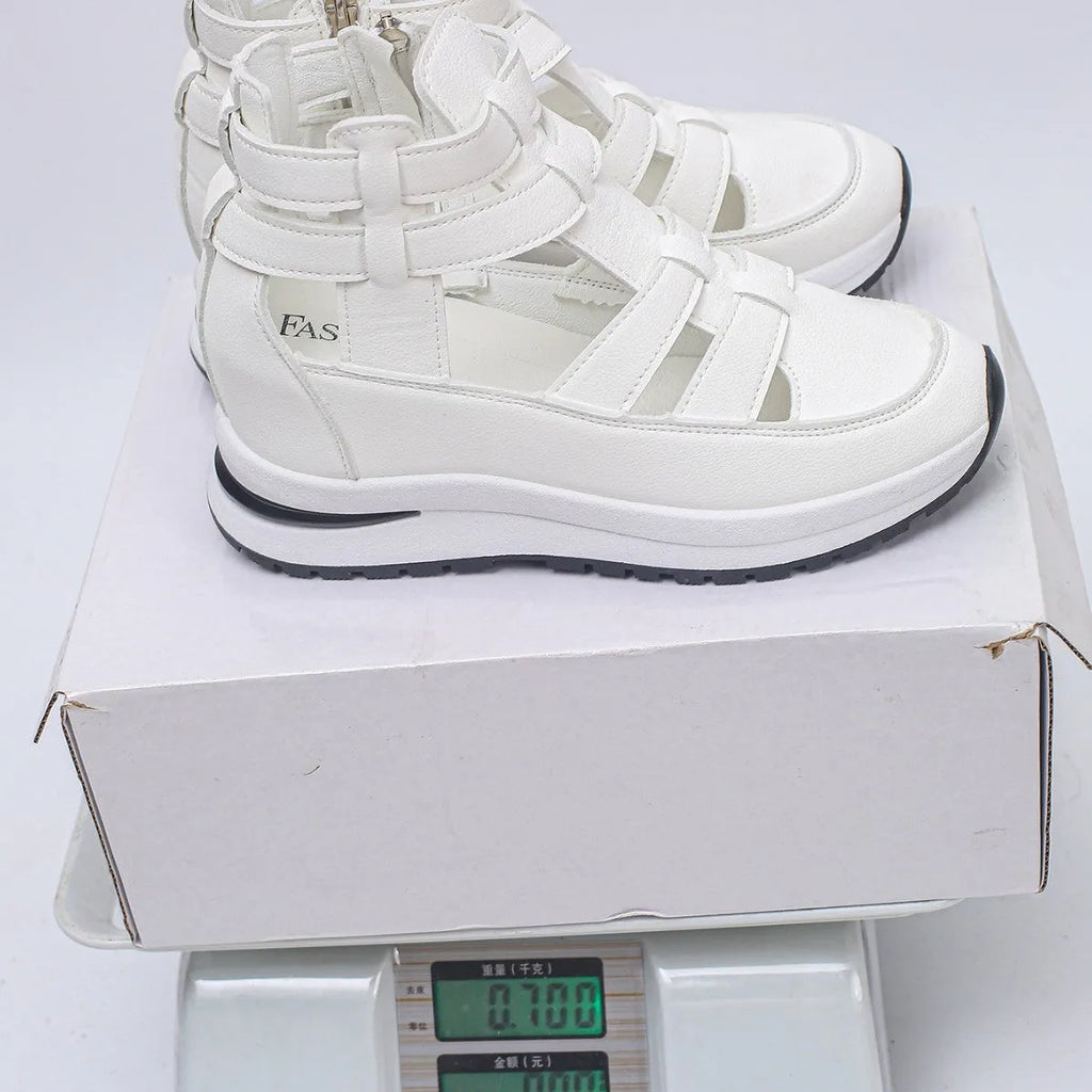 Women's black platform sandals with close-toe design and Velcro fastening