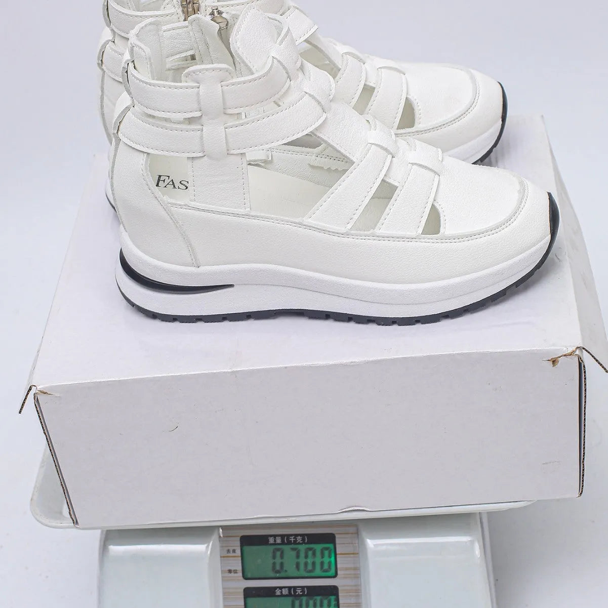 Women's black platform sandals with close-toe design and Velcro fastening